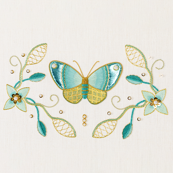 Blue and gold embroidered butterfly full view