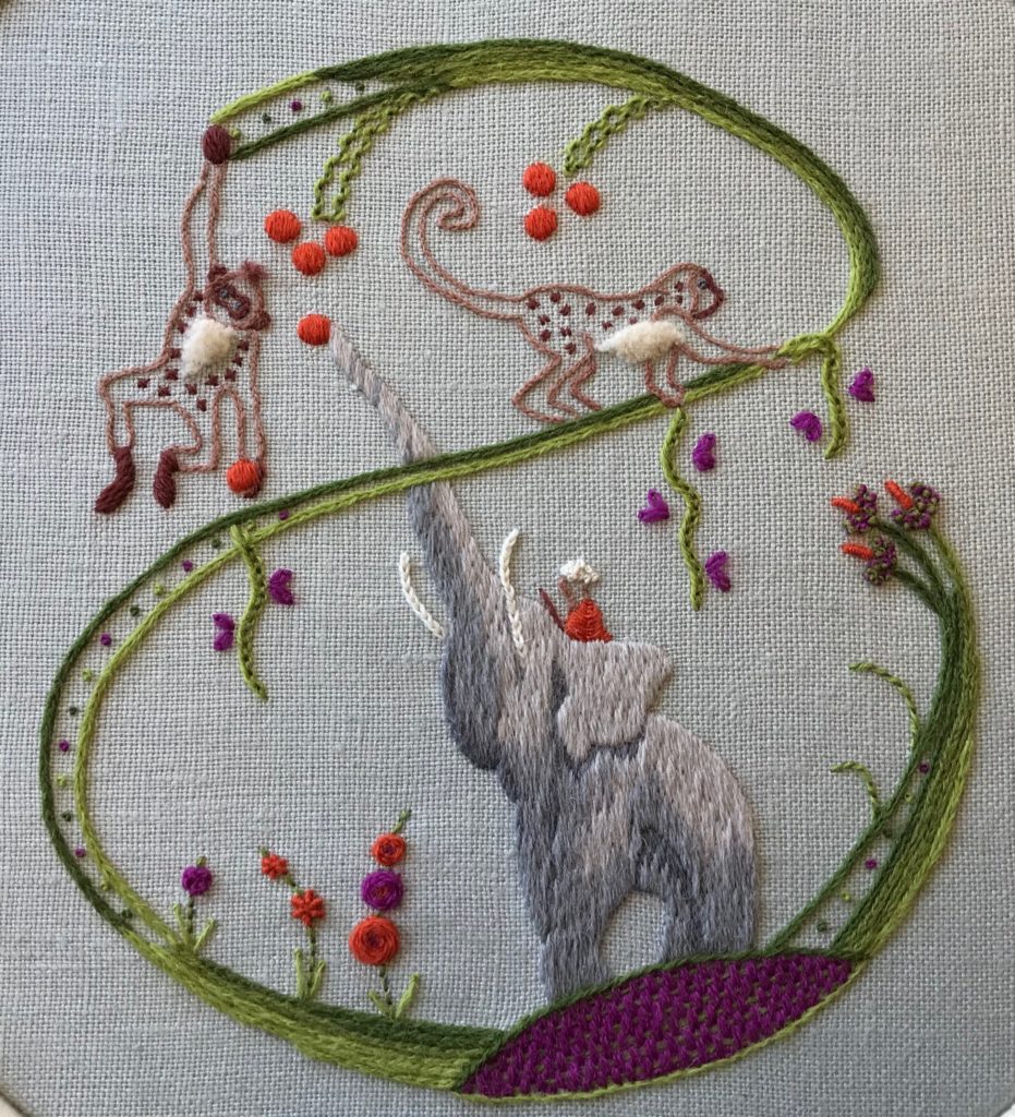 Elephant and money embroidered piece close up