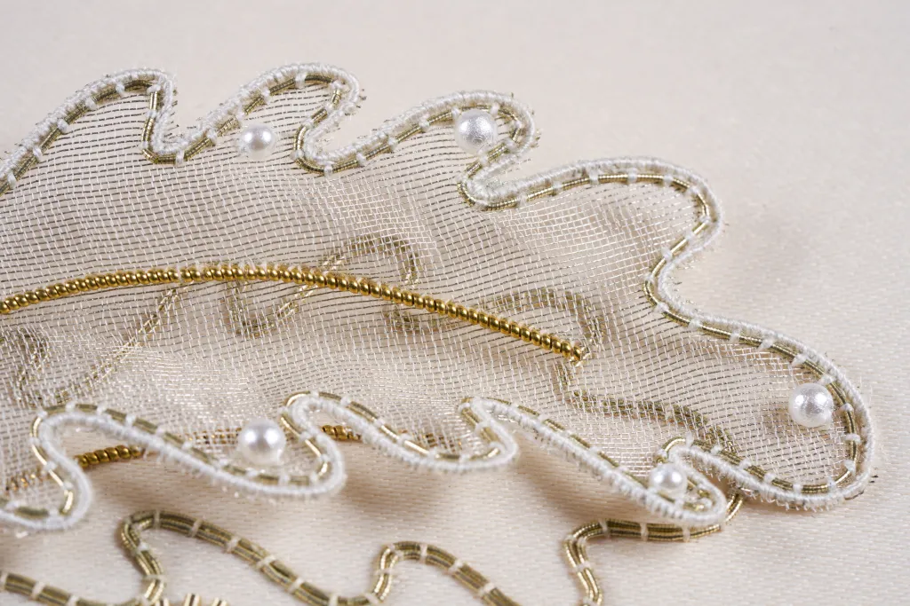 HCP26072 Abstract botanicals in goldwork and raised work.2